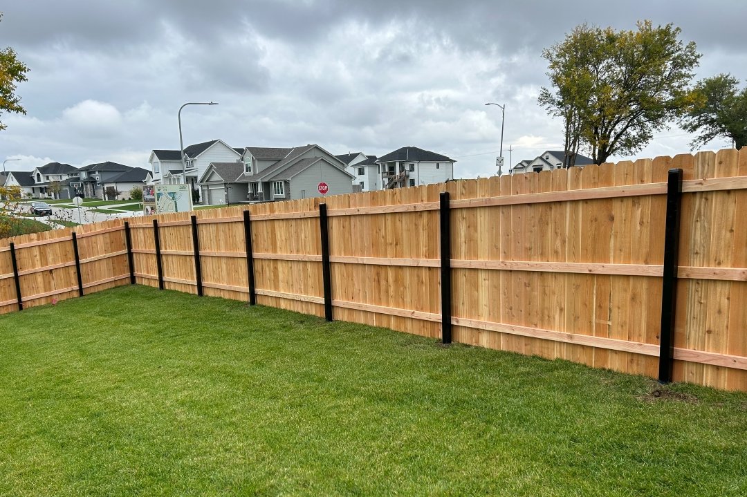 Cedar w/ Steel Posts installed in Lockport, IL by AmeriDream Fence & Deck
