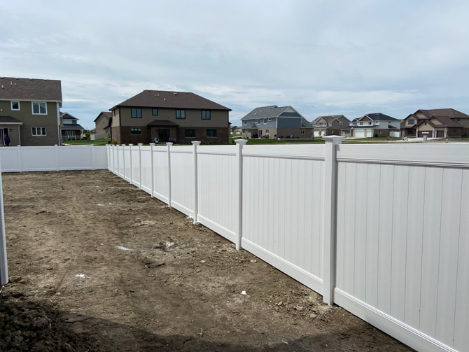White vinyl privacy fence installed in Chicagoland