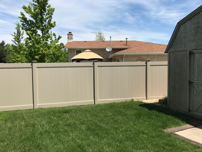 Tan Vinyl Privacy installed in Naperville, IL by AmeriDream Fence & Deck